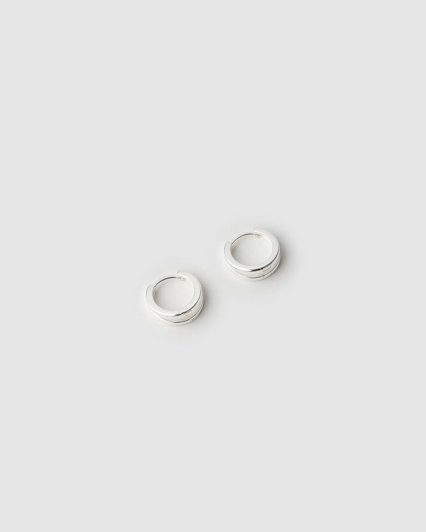 Jean Silver Huggie Earrings