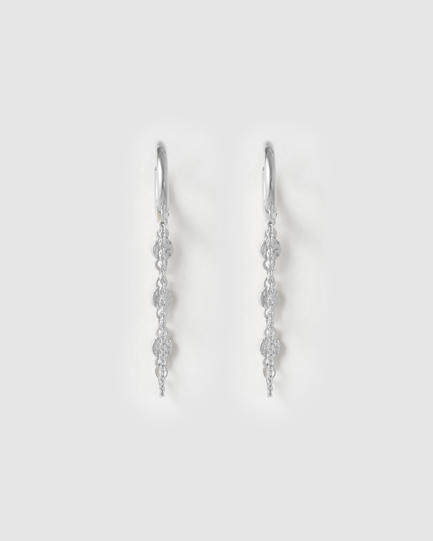 Paloma Silver Huggie Earrings