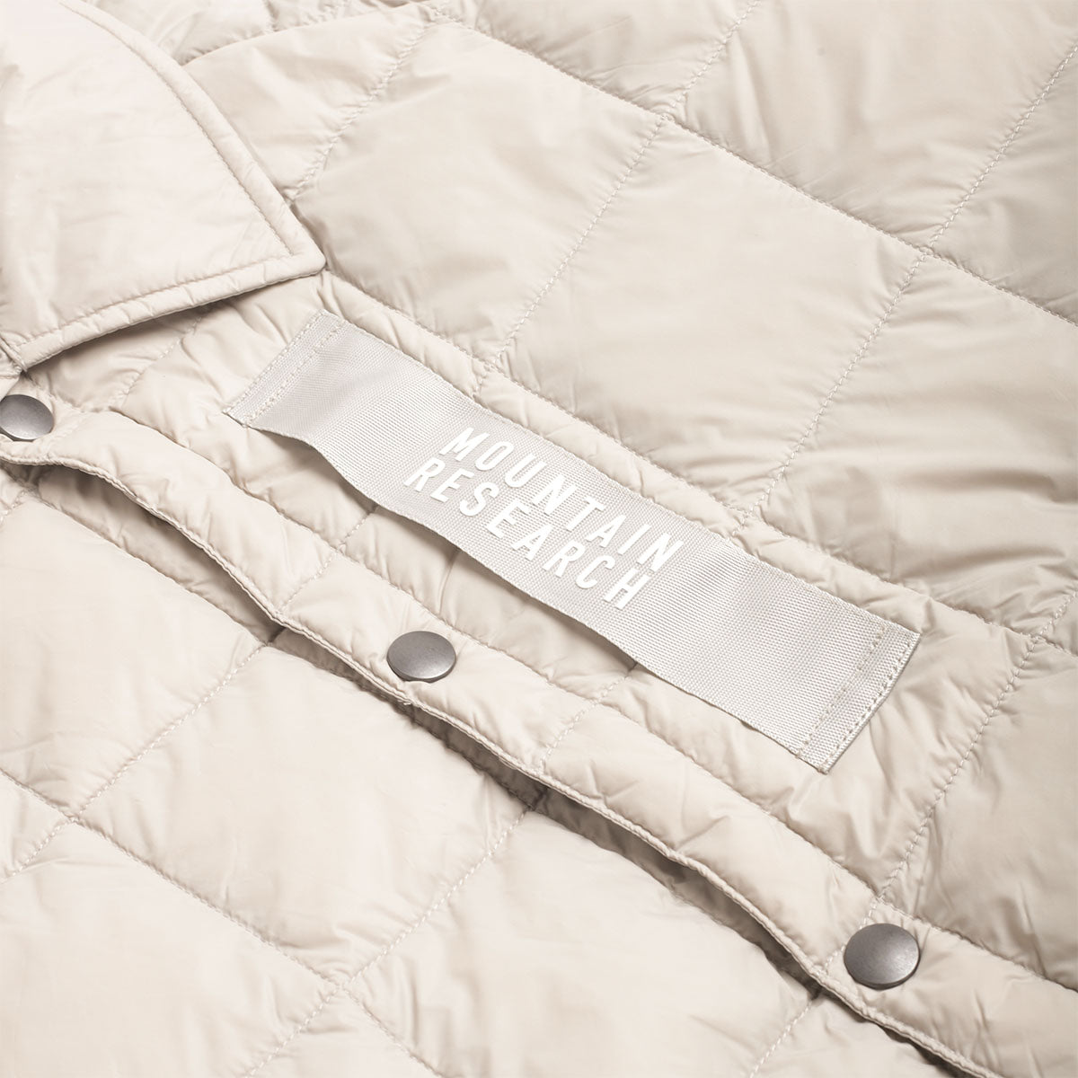 Taion x Mountain Research Down Coach Jacket